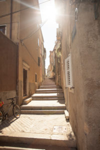 View in an alley in Cres, Croatia View in an alley in Cres, Croatia